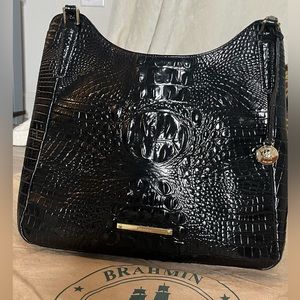 Black multi-textured Brahmin shoulder bag.